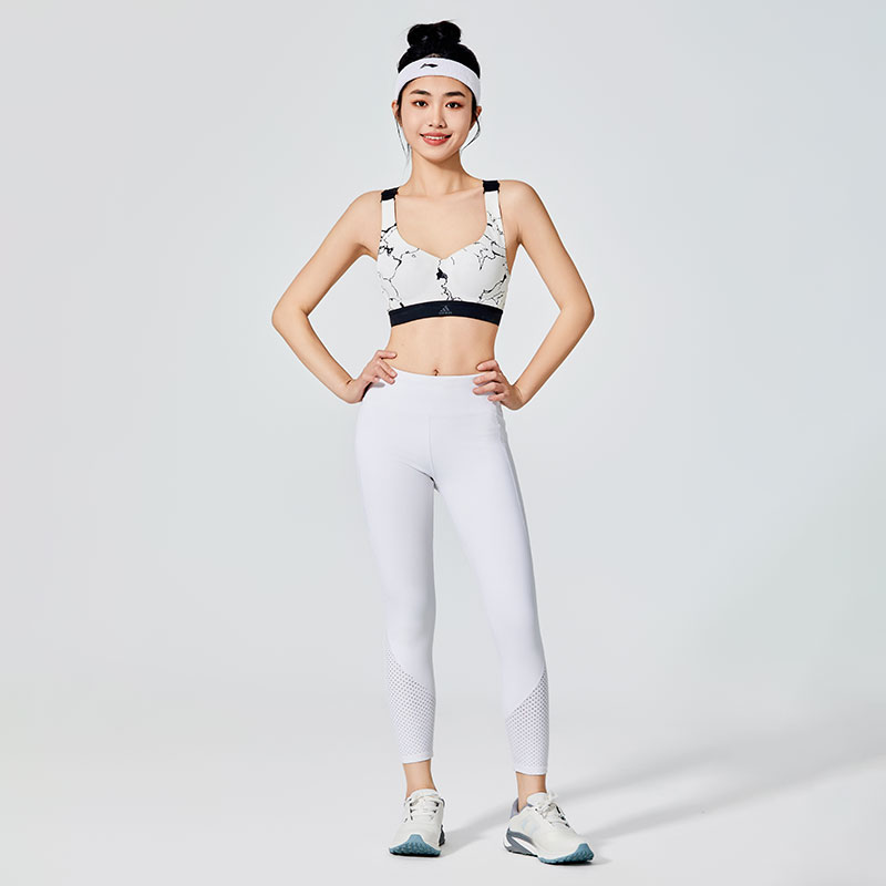 Leggings de sport blanc pur pour femmes avec maille