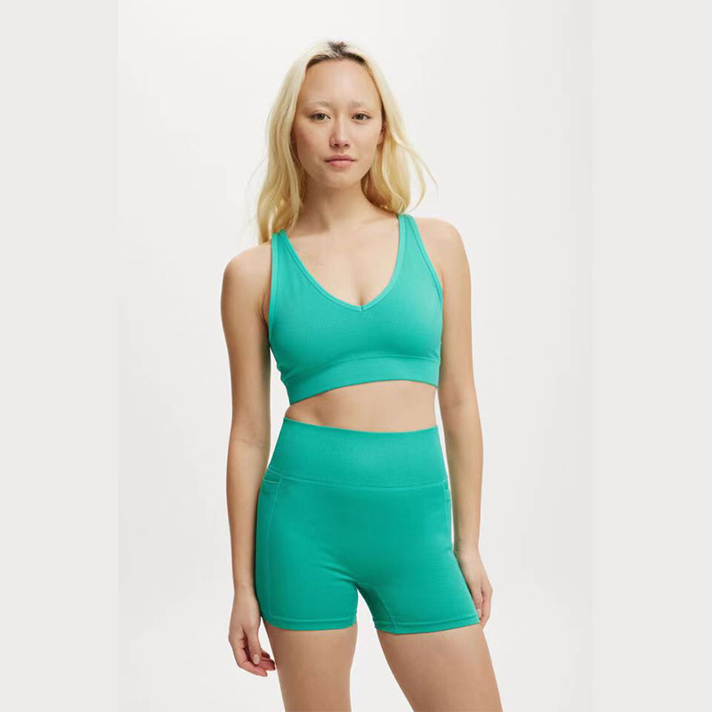 Short sans couture de couleur unie pour femmes avec poches